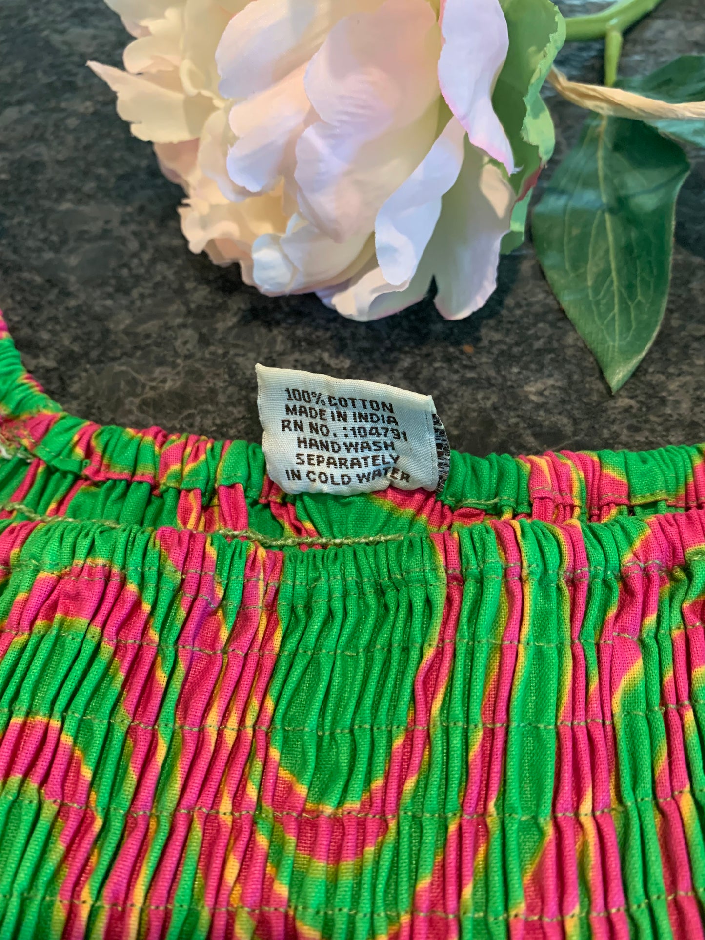 African Apparels Smocked Peplum Top NWOT